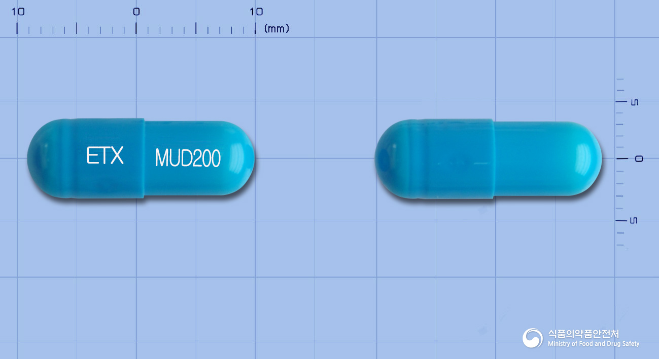 뮤코다인캡슐200mg(아세틸시스테인) 낱알 사진